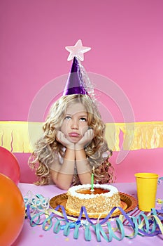 Bored little blond girl birthday party