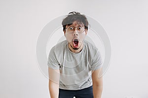 Bored man feel shocked and surprised isolated on white.