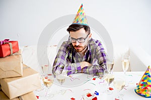 Bored man at party