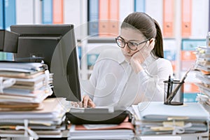 Bored office worker sitting at desk