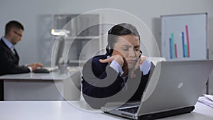 Bored operator in headset at workplace waiting for customer call, telemarketing