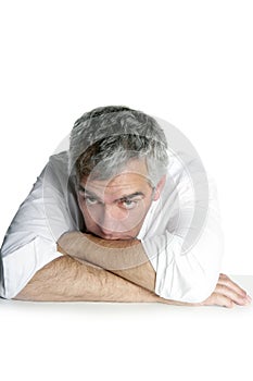 Bored senior businessman on table desk