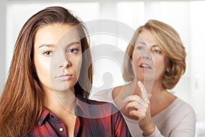 Bored Teenage Girl Being Told Off By Mother