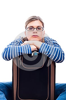 Bored traveller tourist woman with luggage