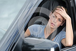 Bored woman in car