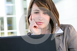 Bored Woman on Laptop Computer