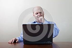 Bored yawning businessman