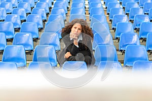Bored young woman sitting waiting photo