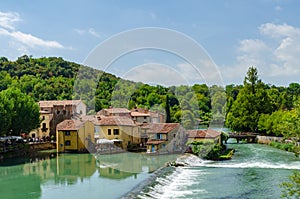 Borghetto, Italy - July 28, 2015: The small village of Borghetto Sul Mincio seen from top of the Visconti Bridge, Italy