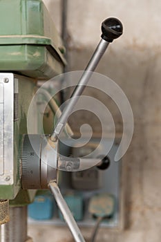Boring machine in a carpenter workshop