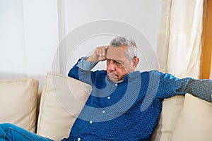 Boring stress worries the old man, the old man thinks a lot and feels an anxious, grumpy expression
