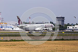 A7-AEH Qatar Airways Airbus A330-300 aircraft landing on the runway