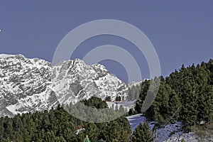 Bormio, Italy - January 31, 2005: Ski slope in Bormio between tr