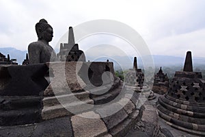 Borobudur stupas overlooking the mountains. Magelang. Central Java. Indonesia