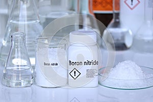 Boron nitride in container, chemical analysis in laboratory