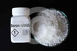 Boron nitride in container, chemical analysis in laboratory