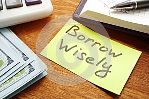 Borrow Wisely sign and money. Choose loan concept