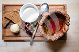 Borsch, traditional ukrainian soup served in bread bowl. Restaurant top view