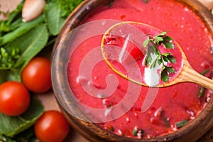 Borsch in a wooden plate