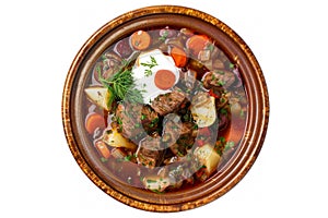 borscht with beets, cabbage, potatoes, carrots, and beef in a rich and hearty broth, garnished with sour cream and dill.