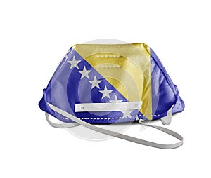 Bosnia and Herzegovina flag on anti pollution mask for protection from virus