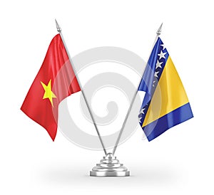 Bosnia and Herzegovina and Vietnam table flags isolated on white 3D rendering