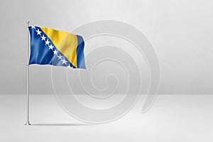 Bosnia and Herzegovinan flag isolated on white concrete wall