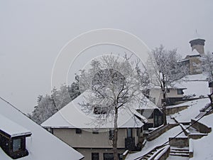 Bosnian village and castle in snow storm