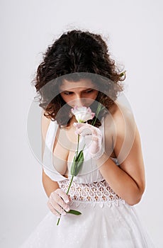 Bosomy girl in low-necked dress.