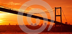 Bosphorus Bridge in Istanbul at sunset photo