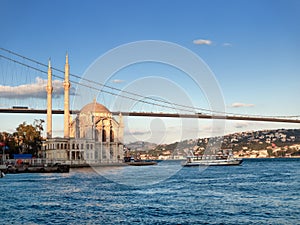 Bosphorus Bridge and Ortakoy Mosque in Istanbul photo