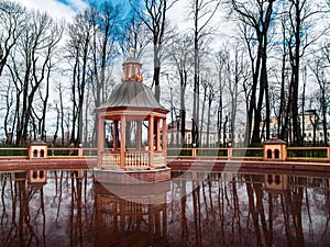 Bosquet `Menagerium pond` in the Summer Garden in the early spring in April in St. Petersburg