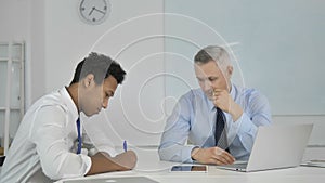 Boss, Businessman Giving Dictation to Employee at Work, Paperwork