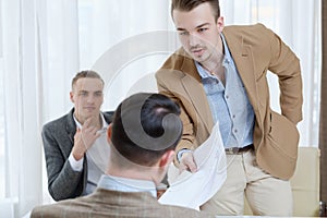 Boss employee giving lecture reprimand business photo