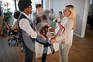 Boss and an employee wishing welcome to a new female colleague. new, job, beginning, enthusiastic, business, casual, modern open