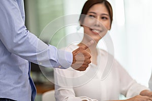 Boss encourages good job showing thumbs up to employee to get rewarded