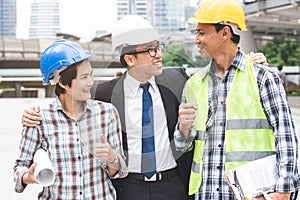 Boss encouraging worker after project done