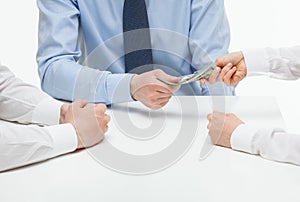 Boss giving dollars to collaborator photo