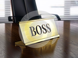 Boss nameplate on wooden table