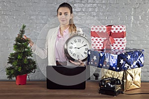 Boss reminds you about the holidays, the clock in your hand