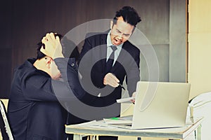 Boss shouting to employee while mistake working.