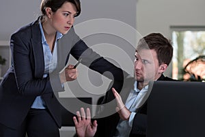 Boss threatening to her employee photo