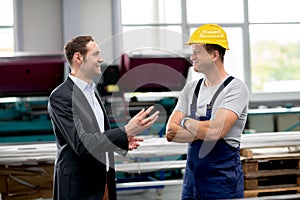 Boss and worker in conversation