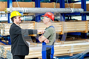 Boss and worker in conversation