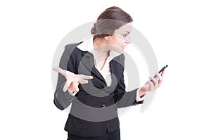 Bossy female manager demanding explanations over video call