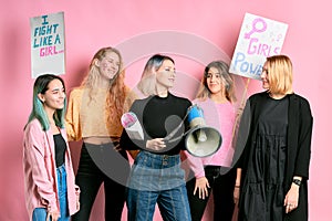 Bossy strong girls feminists isolated in pink background