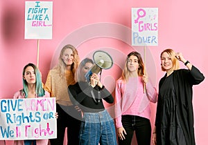 Bossy strong girls feminists isolated in pink background