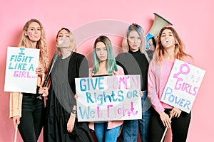 Bossy strong girls feminists isolated in pink background