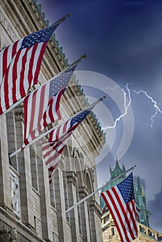 Boston Building and American Flags under a coming storm, Massachusetts