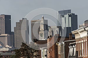 Boston city apartment buildings in front of skyline in Massachusetts USA